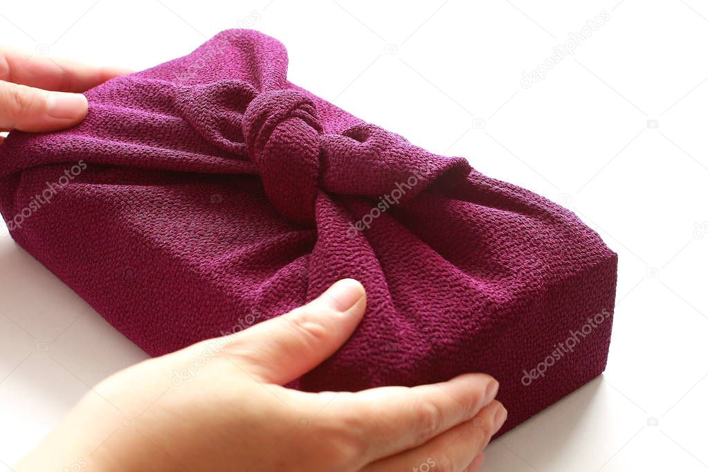 Handing Gift with Japanese Wrapping Cloth Furoshiki, Japanese culture